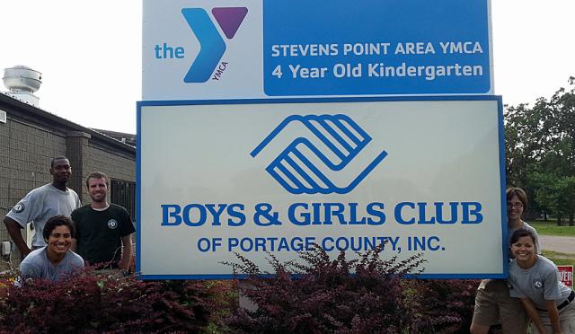Article Thumbnail. Maple 1 gathers for a quick photo after arriving at the Boys and Girls Club of Portage County, Wis.